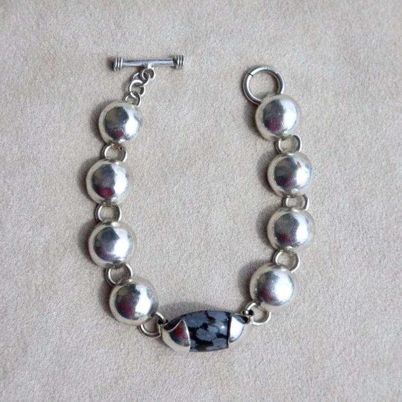 Snowflake Jasper Bracelet Taxco Sterling Silver Mexican Artisan Jewelry Vintage Statement Piece Modernist Design Black Stone Detail Toggle Clasp Feature Handcrafted Quality Collectible Treasure Elegant Accessory Gift Idea Special Occasion
