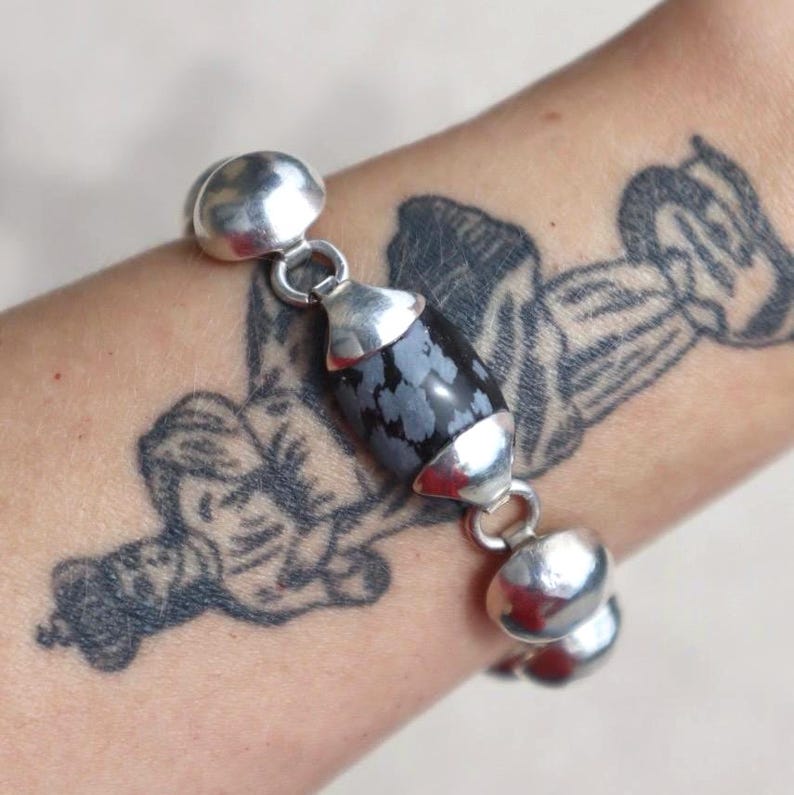 Taxco Sterling Bracelet Vintage Silver Jewelry Mexican Artisan Crafted Snowflake Jasper Stone Statement Piece Modernist Design Toggle Clasp Collectible Treasure Unique Gift Idea Special Occasion Jewelry Black Stone Detail Handmade Quality