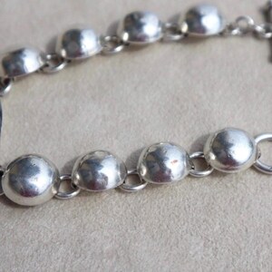 Handcrafted Silver Bracelet Taxco Sterling Jewelry Snowflake Jasper Stone Mexican Vintage Piece Statement Accessory Modernist Design Black Stone Detail Toggle Clasp Feature Artisan Quality Collectible Treasure Gift Idea Special Occasion