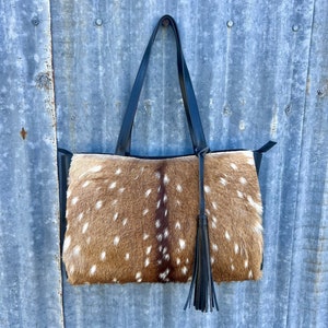 Back in stock!  Our BESTSELLING Axis hide bag - South Texas axis, luxe leather, pin stripe liner
