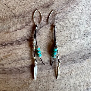 minimalist leather cord earrings with genuine turquoise beads, silver plated feather and beads, and sterling silver ear wire