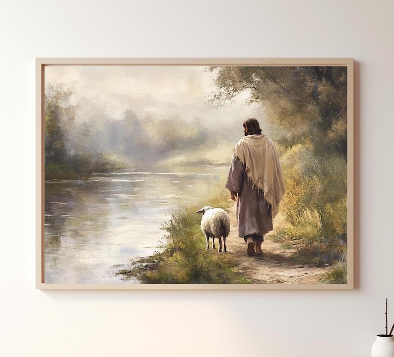 May include: A painting of a man in a long robe walking with a white lamb on a path by a river. The background is a misty forest.