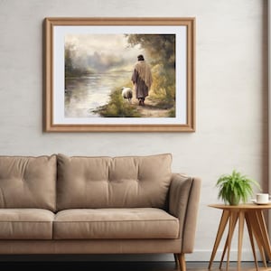 May include: A painting depicting a figure in a long robe walking with a sheep along a path beside a river. The scene is set in a misty woodland with a soft, muted colour palette.