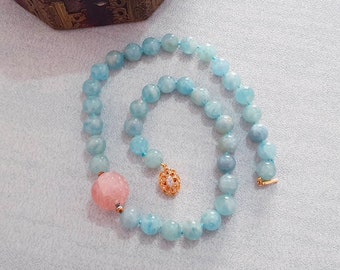 Collana con perline di acquamarina e morganite: chiusura Art Déco in oro 18 carati