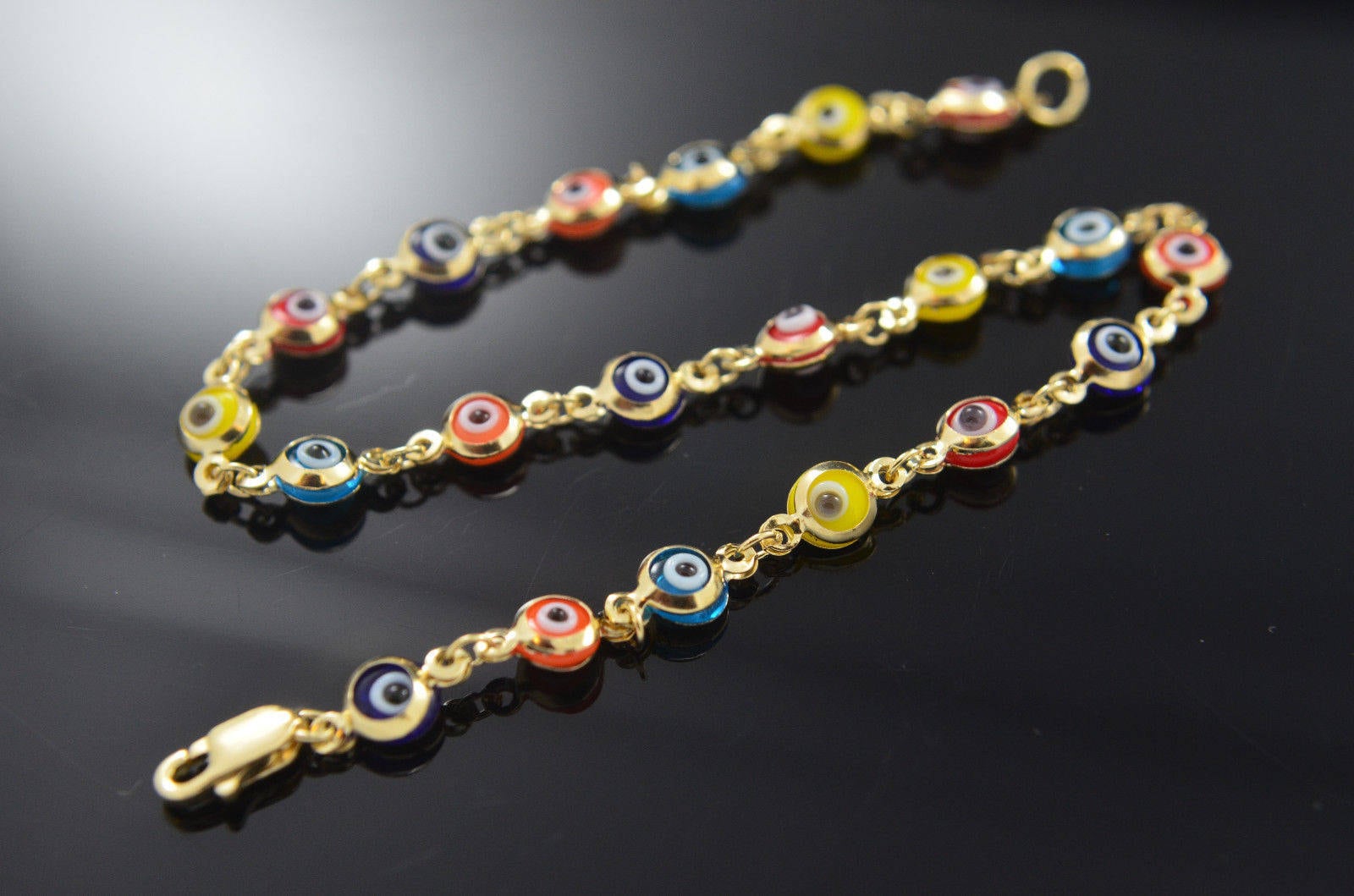Gold ojo bracelet deals