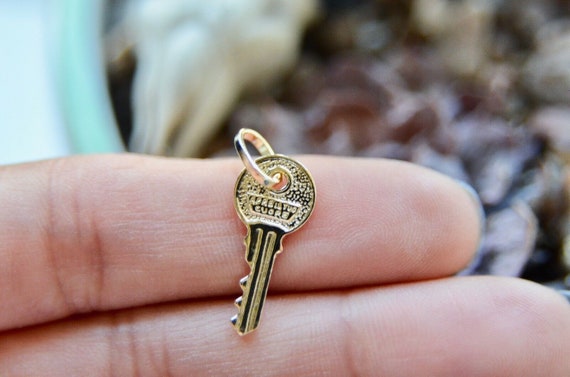 Understanding the Meaning Behind Key Necklaces and Key Charms