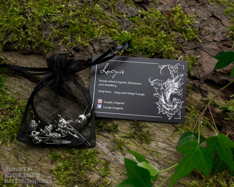 Pagan necklace and earrings with bird skulls