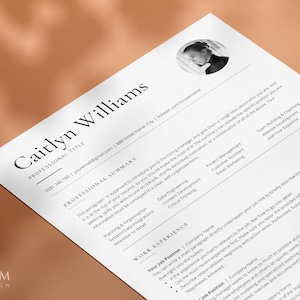 May include: A black and white resume template featuring a professional headshot of a woman. The resume includes a professional summary, work experience, and skills sections.