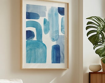 May include: Abstract watercolor painting in shades of blue, framed in a light wood frame. The painting features various shapes and sizes of blue watercolor washes.