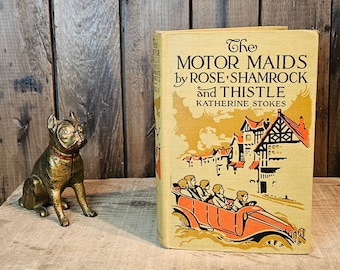 Libro antiguo ~ The Motor Maids By Rose, Shamrock & Thistle ~ Escrito por Katherine Stokes ~ Publicado en 1912 primera edición