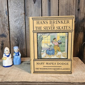 Hans Brinker Or The Silver Skates ~ Written by Mary Mapes Dodge ~ Illustrated by Edna Cooke ~ 1920&#39;s