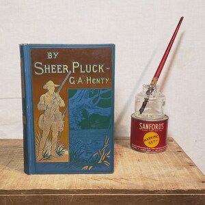 Antique Book ~ By Sheer Pluck - A Tale Of The Ashanti War ~ Written by G. A. Henty ~ Illustrated by Gordon Browne ~ 1890?