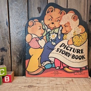 May include: A vintage children's picture story book featuring three cartoon bears. The book cover is illustrated with a brown bear, a white bear, and a yellow bear. The book title is "Picture Story-Book" and the author's name is "Paul Gachet".