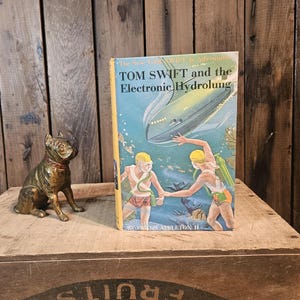 TOM SWIFT e o Hidropulmão Eletrônico ~ Escrito por Victor Appleton II ~ Ilustrado por Charles Brey ~ 1961
