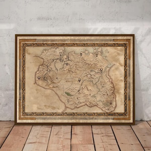 May include: A rectangular framed wall art piece featuring a detailed fantasy map on aged, parchment-style paper. The map displays various geographical features, mountain ranges, and labeled locations, all enclosed within a decorative brown border.