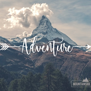 May include: A white arrow with a mountain range in the background. The arrow points to the right and has the word "Adventure" written in white cursive script above it. The text "MOUNTAINSIDE VINYL" is in the lower right corner of the image.