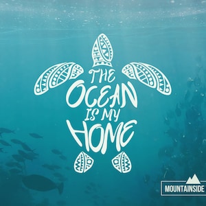 May include: White silhouette of a turtle with a patterned shell and the text "The Ocean is My Home" on a blue background with a school of fish.