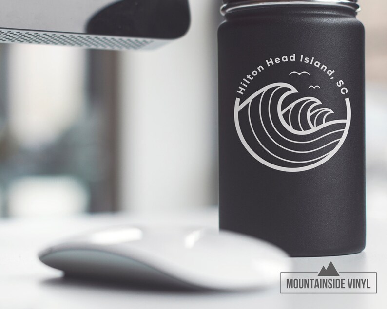 May include: Black insulated water bottle with a white graphic of a wave and the text "Hilton Head Island, SC". The text "MOUNTAINSIDE VINYL" is printed on the bottom of the bottle.