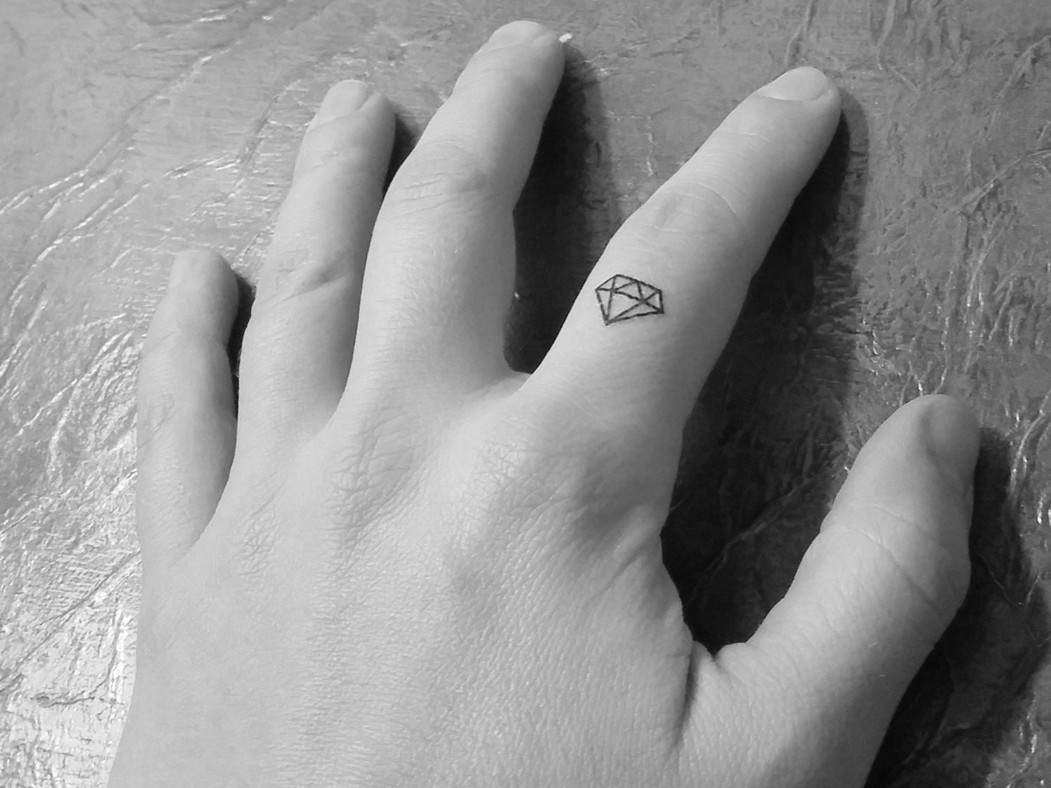 Red Ink King Queen Couple Heart Tattoo Design On Ring Finger  Truetattoos