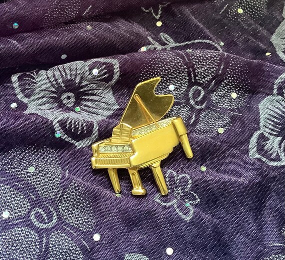 Fabulous golden coloured Grand Piano decorated wi… - image 1