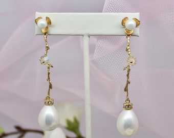 Boucles d'oreilles en cristal de perles d'eau plaquées d'or dangle