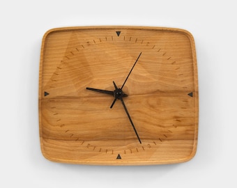 Rysu - wooden wall clock. Carved out of a single beech piece in a form of mountain range.