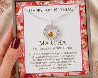 Collier 70e anniversaire, sept anneaux pour sept décennies