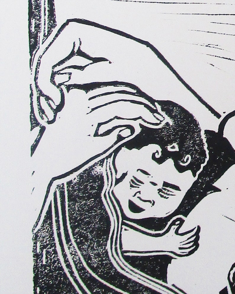 May include: Black and white woodcut print of a hand holding a sleeping child. The child is wrapped in a blanket and has a peaceful expression on their face.