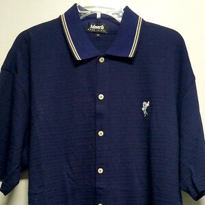 Still With Tags On IT never Worn VINTAGE 1 Polo Style Shirt 1989 by GUESS With Logo on front says GUESSvU.S.A