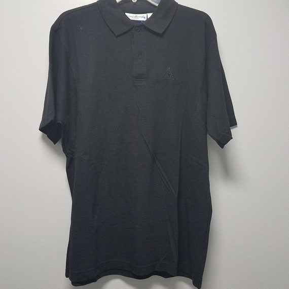 Still With Tags On IT never Worn VINTAGE 1 Polo Style Shirt 1989 by GUESS With Logo on front says GUESSvU.S.A