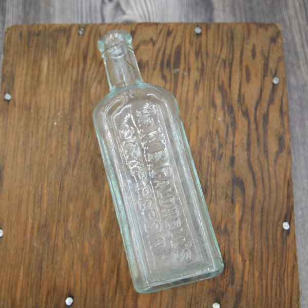 ANTIQUE AQUA BOTTLE, antique glass medicine bottle circa 1900, embossed apothecary advertising, applied lip, vintage bathroom vanity decor