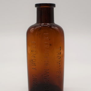 1880's AMBER MEDICINE BOTTLE large embossed Trommer Extract of Malt Fremont Ohio apothecary tincture advertising bathroom decor collectible