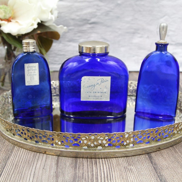 EVENING IN PARIS vintage perfume bottles,bath salts glass bottles,sold individually, cobalt vanity bottles, navy blue advertising bottle