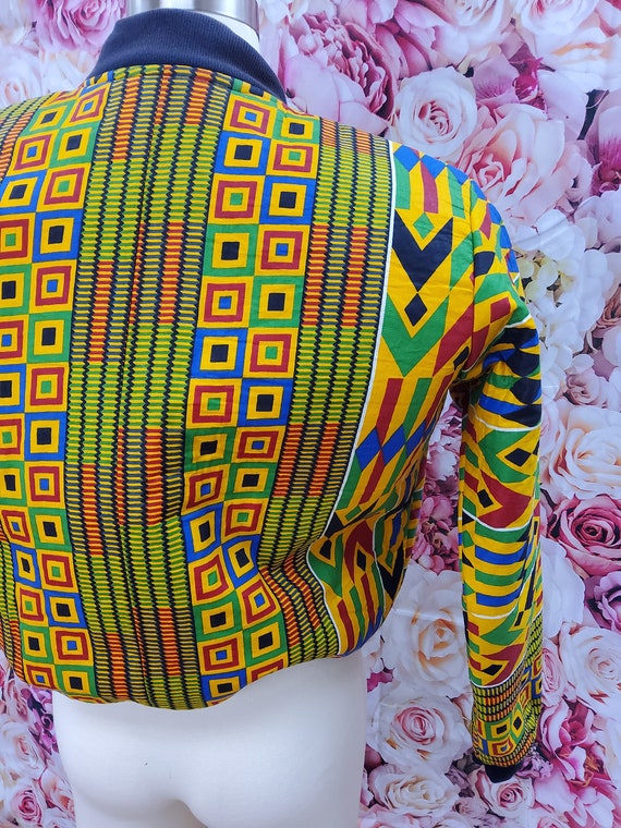 African print bomber jacket. Ankara bomber jacket. Ankara jacket. Ankara mixed print jacket. Puffy jacket.