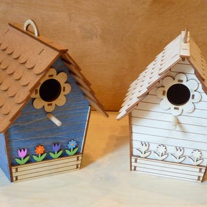 Blue Cottage Birdhouse with colorful flowers