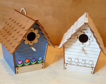 Blue Cottage Birdhouse with colorful flowers