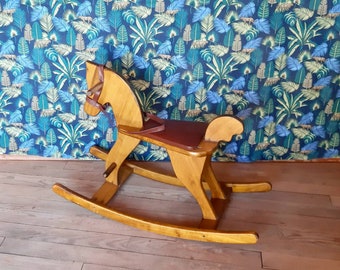 Vintage rocking horse. French vintage.