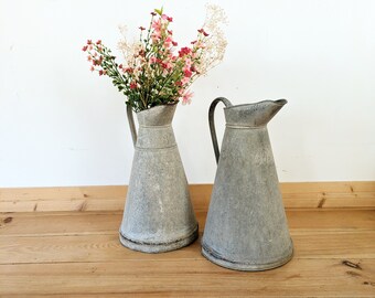 Set of two vintage zinc pitchers. French vintage.