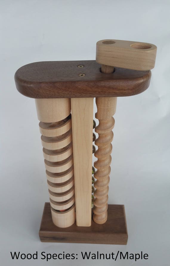 The Crank: Un jouet en bois avec des billes fabriqué à la main