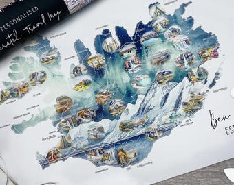 May include: A personalized scratch-off travel map of Iceland, featuring watercolor illustrations of landmarks. The map includes the text "PERSONALISED Scratch Travel Map" and the name "Ben + EST.". The map is rolled up next to the map.