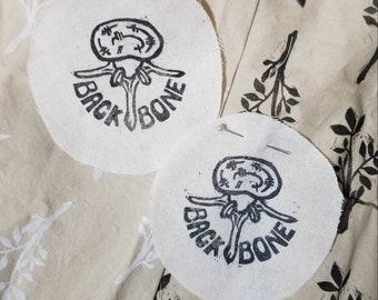 backbone | relief block print patch punny folk punk sew on diy lumbar vertebrae