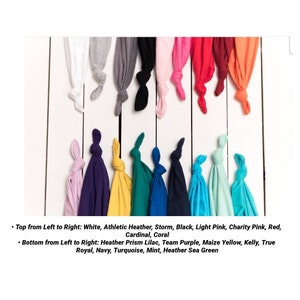May include: A collection of 18 t-shirts in various colors, including white, black, red, pink, blue, green, yellow, and purple. The shirts are arranged in two rows, with the top row showing the shirts from left to right and the bottom row showing the shirts from right to left.