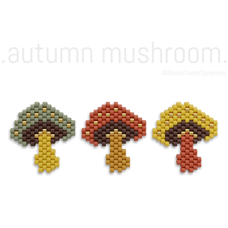 May include: Three beaded mushroom charms in autumnal colors. The mushrooms are green, red, and yellow with brown stems and gold accents.