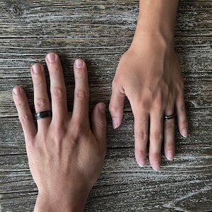 Wedding ring width for both his and hers. Wedding ring hammered black tungsten with whiskey barrel wood