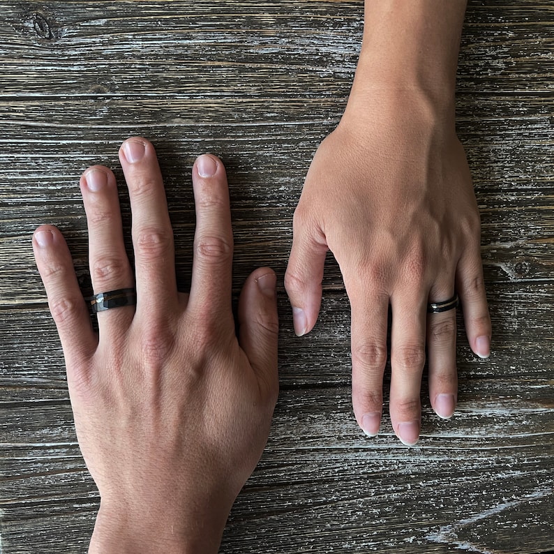 Wedding ring width for both his and hers. Wedding ring hammered black tungsten with whiskey barrel wood