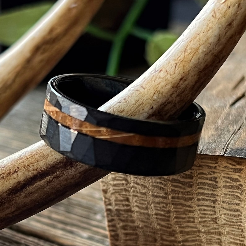 Whiskey barrel ring with black hammered tungsten band