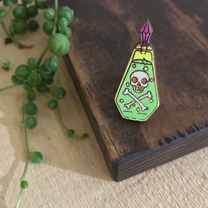 Artist Series Ashley Shaul Glow in the Dark Poison Bottle Pin // The Brave Wimp