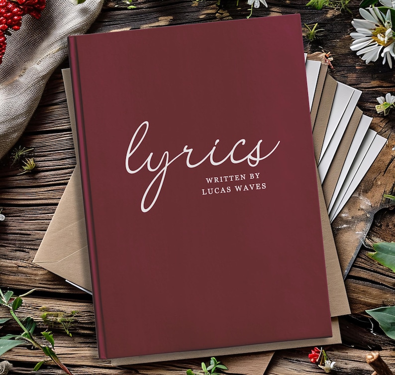 Image of a lyrics journal with custom name. The maroon cover is elegant, ideal for music lovers and lyric enthusiasts. Perfect for capturing song ideas and creative inspirations. Makes an excellent gift for those passionate about songwriting.