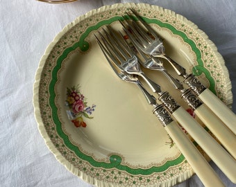 Set of four vintage tea plates