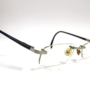 Vintage Occietto Eyeglasses Silver Blue Frames Rimless